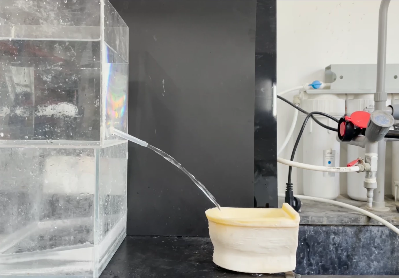 A simulated flush test runs eight liters of water through the ARSS bowl, after which it proves just as slippery as before
