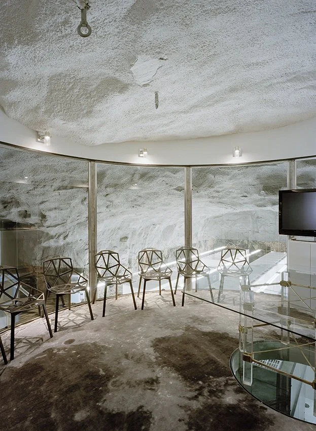 Set 30 meters underground, deep within the bedrock and in what was once used as a Swedish atomic bomb shelter, lies this high security internet center (image from AF-L)