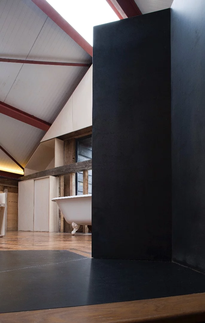 To create definition within the main barn's large interior space, Liddicoat & Goldhill installed a mezzanine