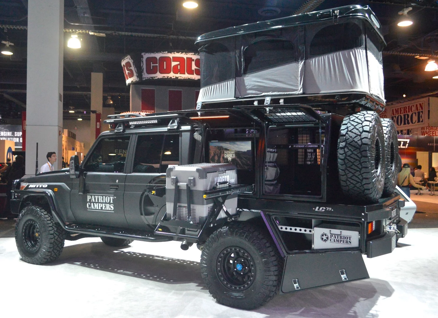 This Patriot LC79 includes a roof-top tent, dog create and slide-out refrigerator