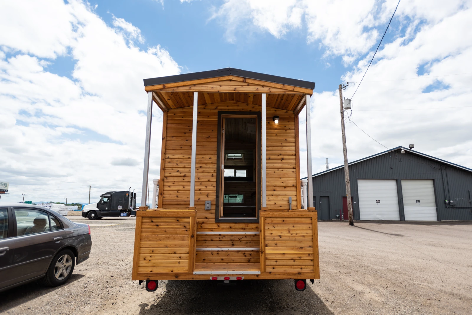 The Tiny Traveler consists of an aluminum frame and cedar wood, with rigid foam insulation