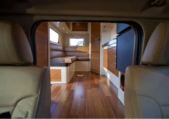 The Siberian has a pass-through between the truck and camper