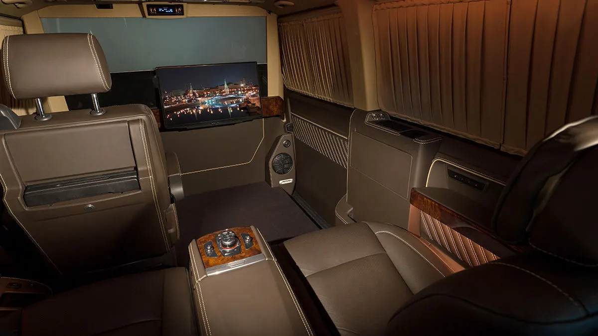 Redline's VW T6 Multivan conversion offers options including window curtains and a refrigerator