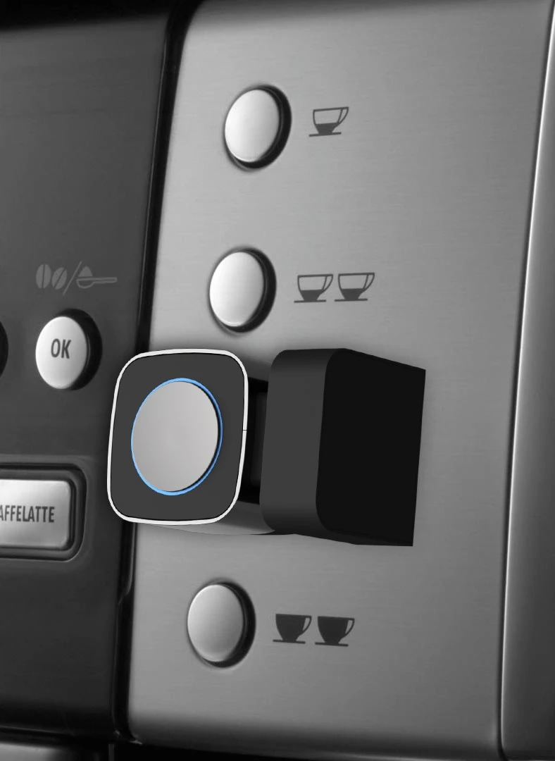 The Microbot Push on an expresso machine
