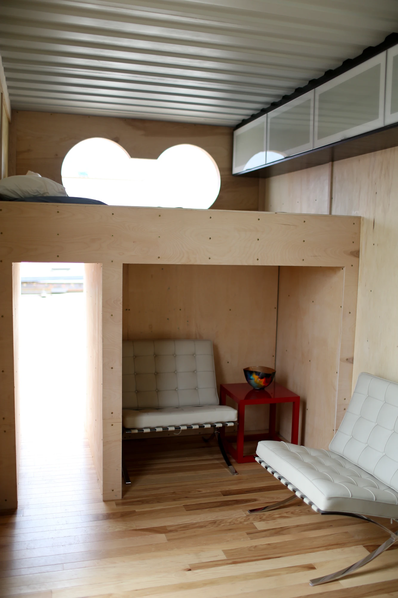 The interior contains bunk-beds and a small lounge area (Photo: Rhino Cubed)