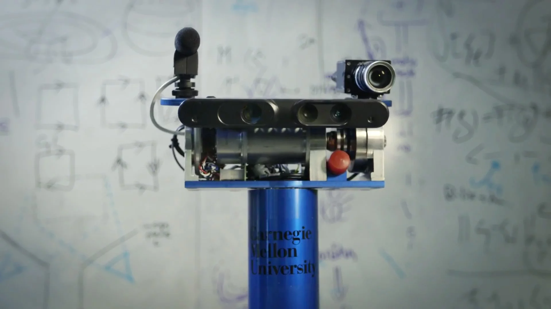 HERB's head is equipped with cameras and other sensors which it uses to sense its environment