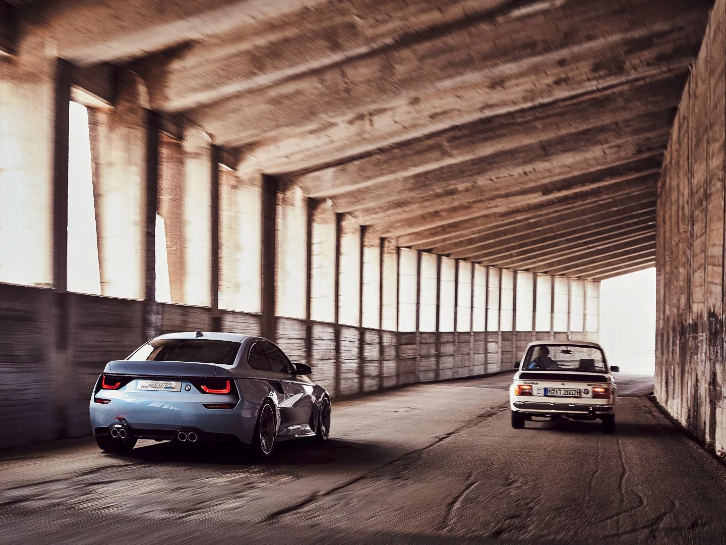 The 2002 Hommage's headlamps are hidden behind the black bar when not in use