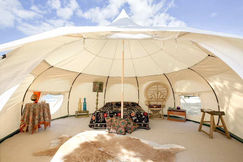 Made from canvas, the shelter features mesh screens and large roof vents