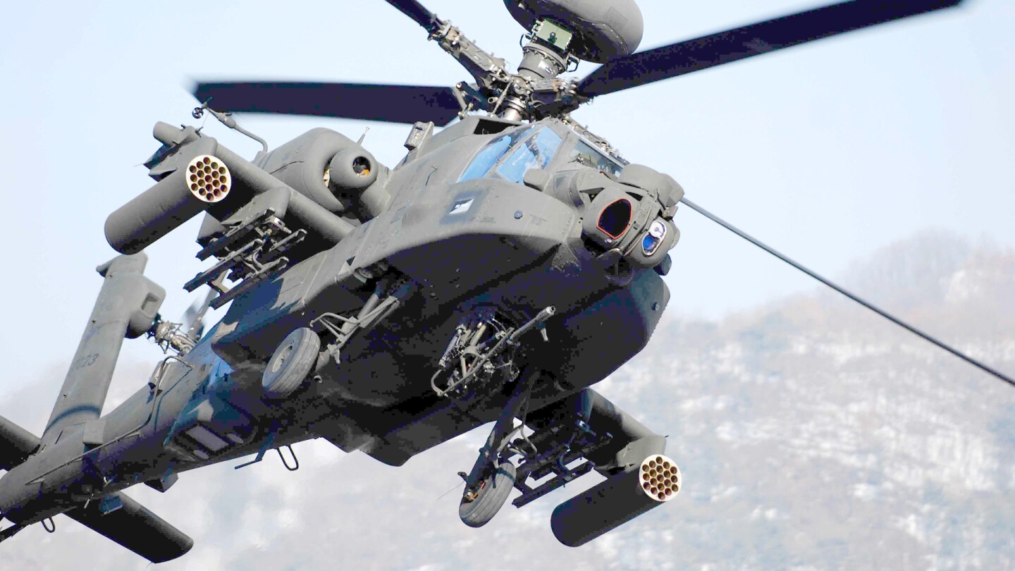 That's a 30-mm M230E1 Chain Gun underneath, while the stub-wing pylons, carry a mission-specific array of armaments, typically including AGM-114 Hellfire anti-tank missiles, and Hydra 70 general-purpose unguided 70 mm (2.76 in) rockets.
