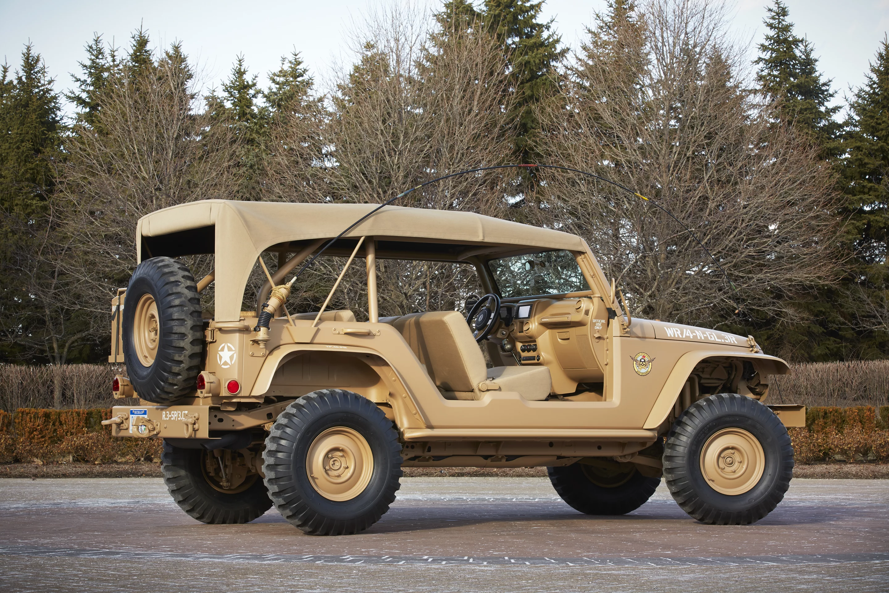 The Jeep Staff Car looks like it should be roaming camp in an old military movie