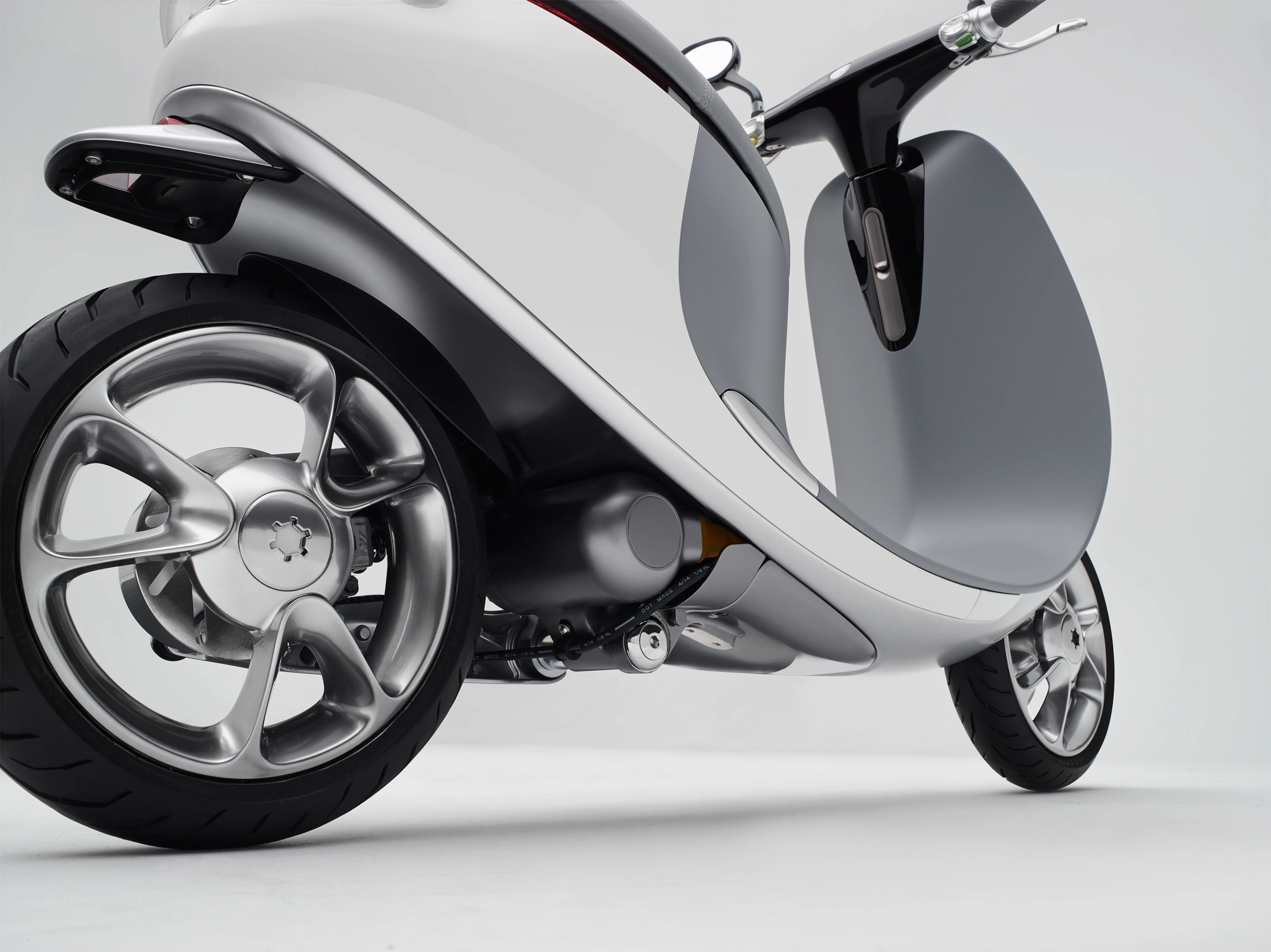 With a frame crafted from racing grade aluminium, the 94 kg (207 lb) Gogoro's electric motor turns out 8.58 hp and a top speed of 95 km/h (60 mph)