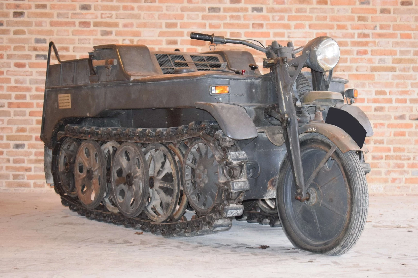 NSU's part-motorcycle, part-tank Kettenkrad was initially built for German airborne troops in WW2 but with its 1,478 cc 4-cylinder Opel engine and all that traction, it quickly found usage in any difficult terrain, gaining a fine reputation as an all-purpose tractor, and it was manufactured until 1948 in post-war Europe due to its versatility. This Kettenkrad sold for $84,709 (€69,136)