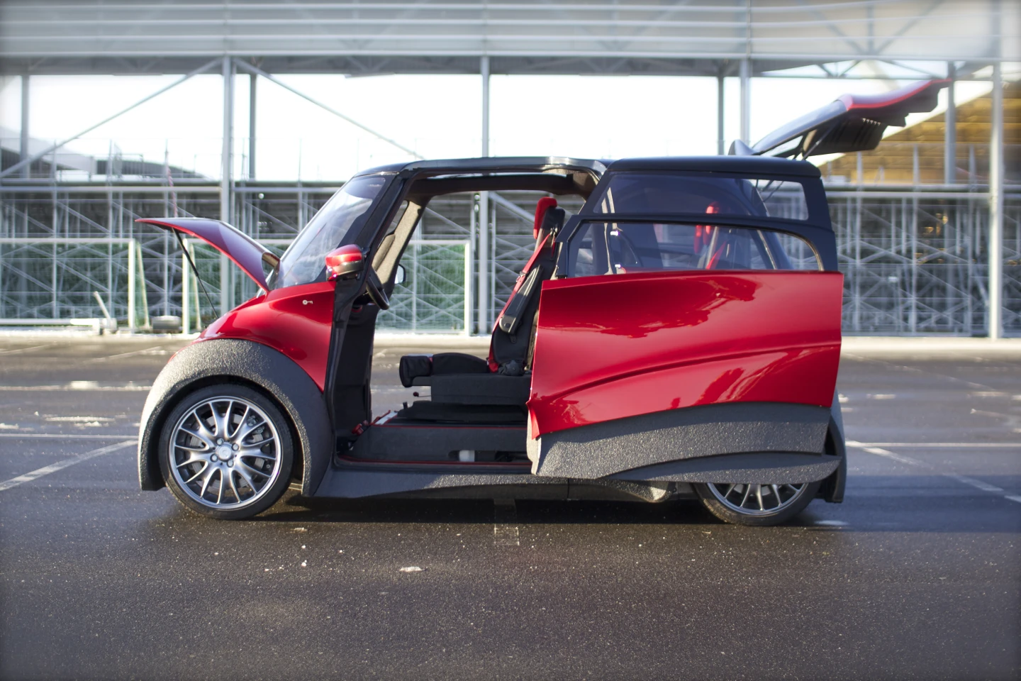 The handle-free sliding doors are operated using a credit-card-like key externally and buttons internally