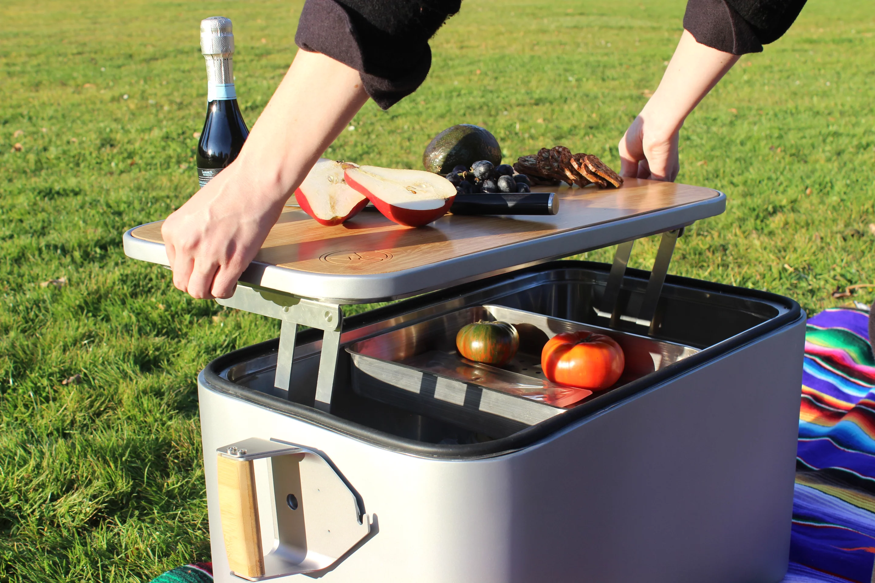 The Wooly cooler features tackle-box-style hinges that allow the lid to effortlessly pop up and away