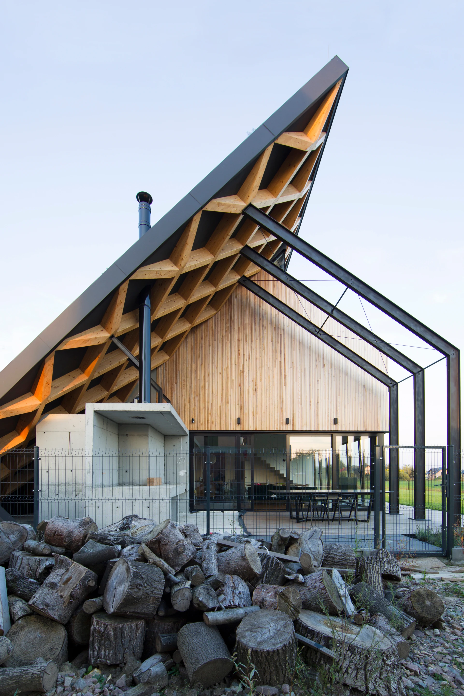 House behind the Roof features extensive use of wood which is untreated and meant to age over time