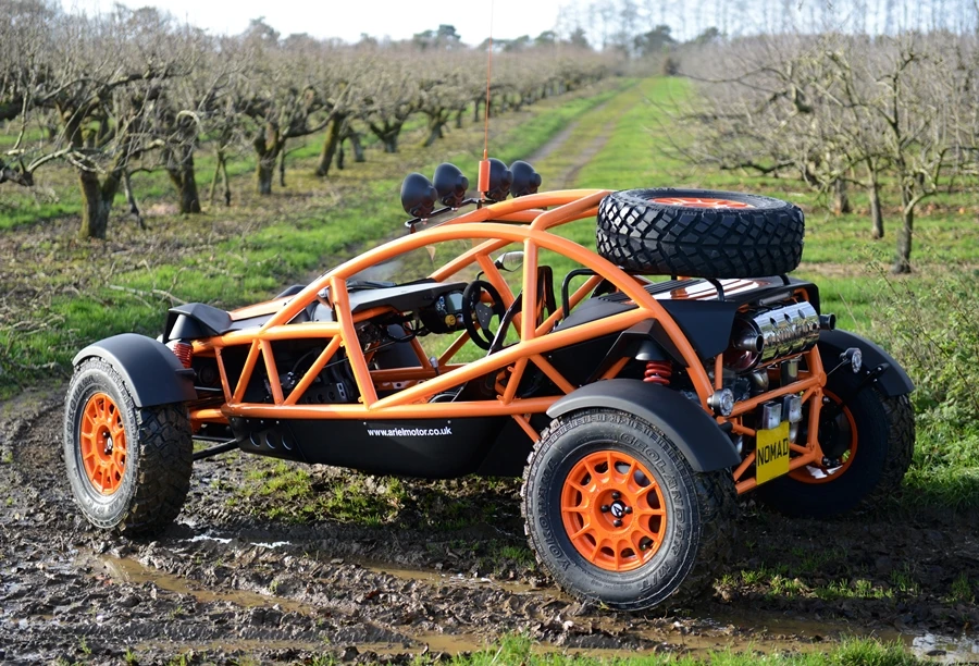 A rear-side view of the Ariel Nomad in the wild