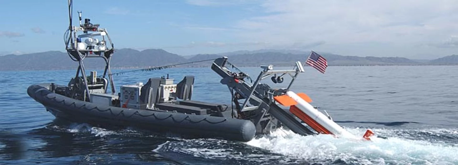 An Autonomous Surface Vehicle from the USA automatically launches a sonar system to hunt mines