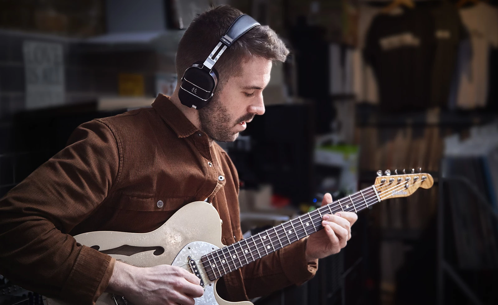 With a transmitter plugged into the guitar and the Waza-Air headphones popped on the noggin, players can noodle away without disturbing other in the home