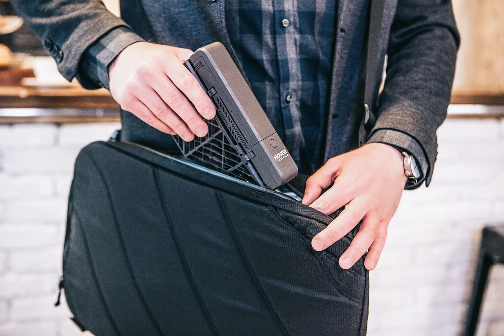 The Hover Camera can be folded up into a tidy modem-shaped form when not in use