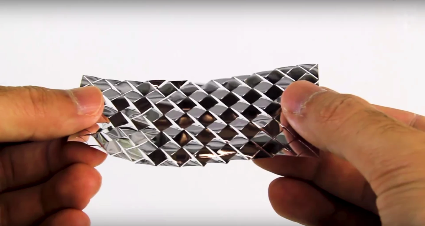 Cutting edge: the kirigami skin becomes grippy when stretched