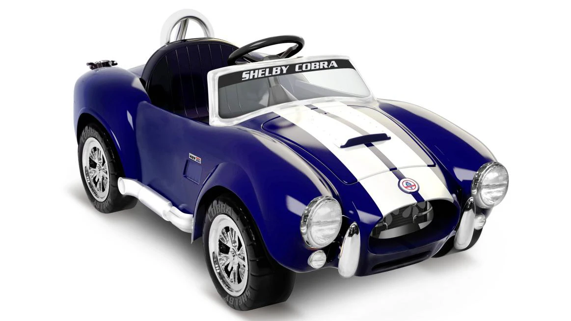 The Shelby Cobra 427 "ride on" travels at speeds of up to 5 mph (8 km/h)