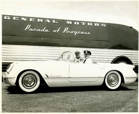The Fire Chief and Chief of Police of Framingham, Massachusetts in a 1953 Chevrolet Corvette with a Futurliner in the background during a visit of the GM Parade of Progress. GM Photo courtesy of NATMUS