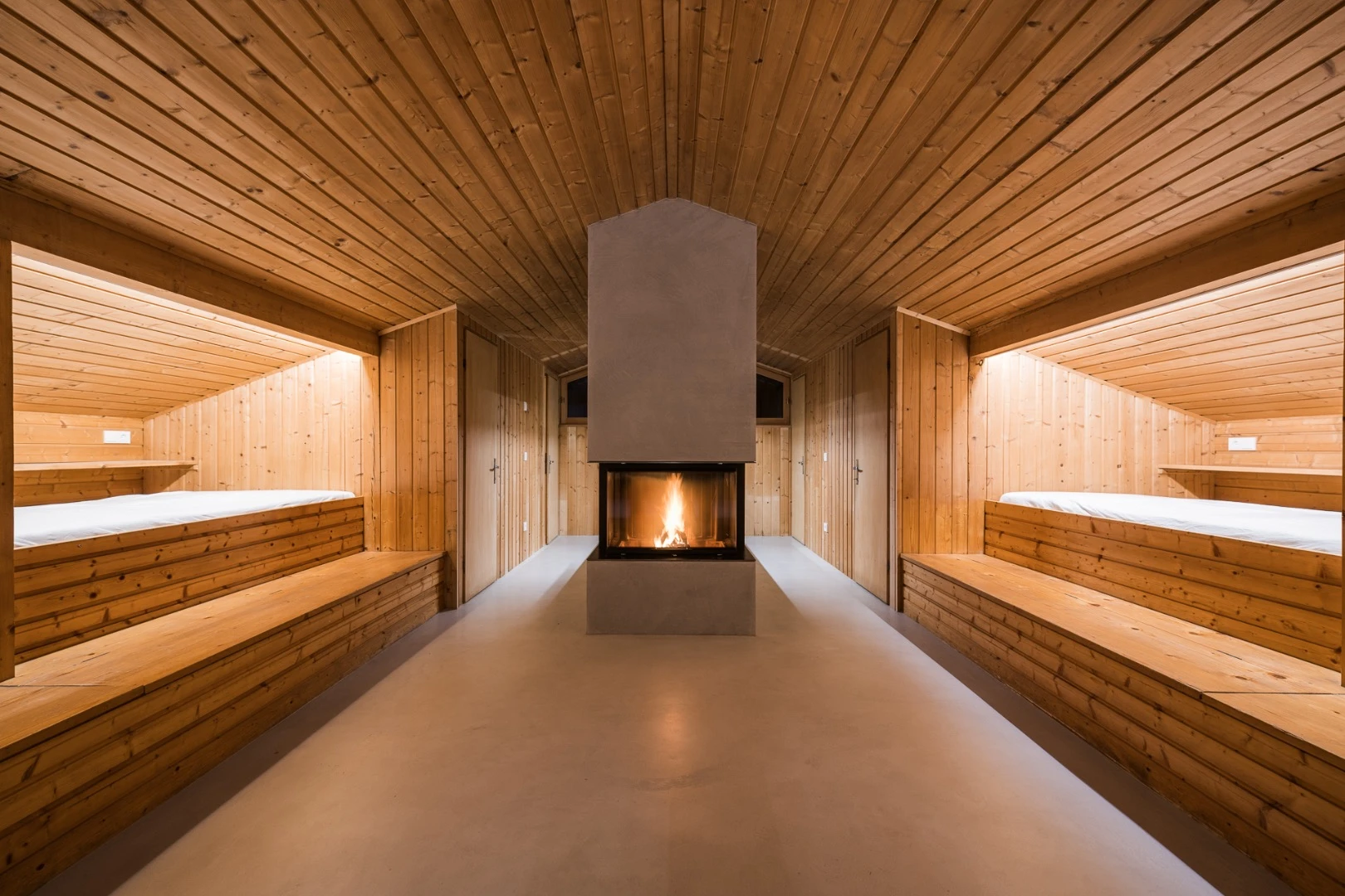UFO's main room includes beds and a fireplace