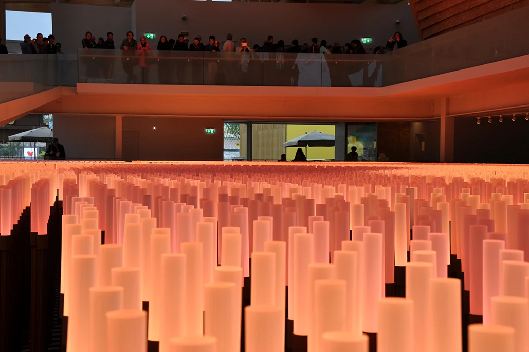 The pavilion features an expansive indoor field of LED lamps