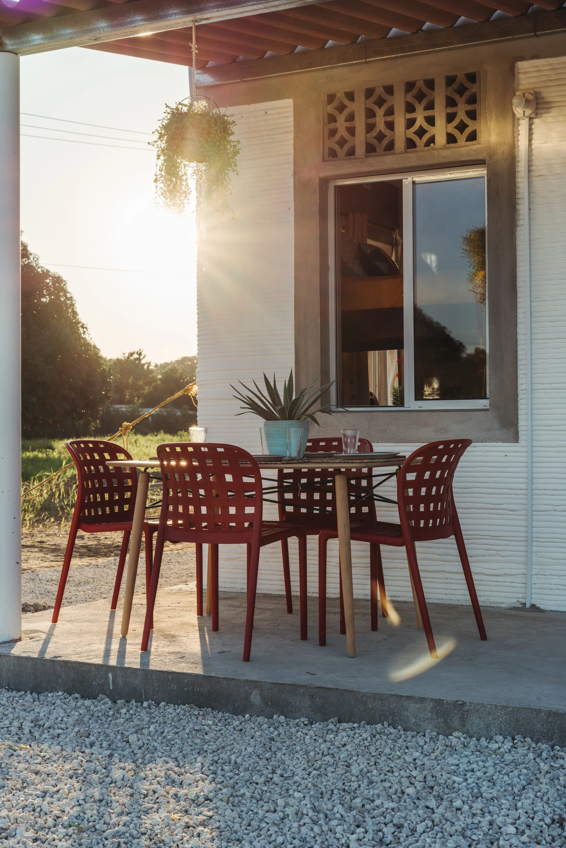 The 3D-printed homes have a covered porch area