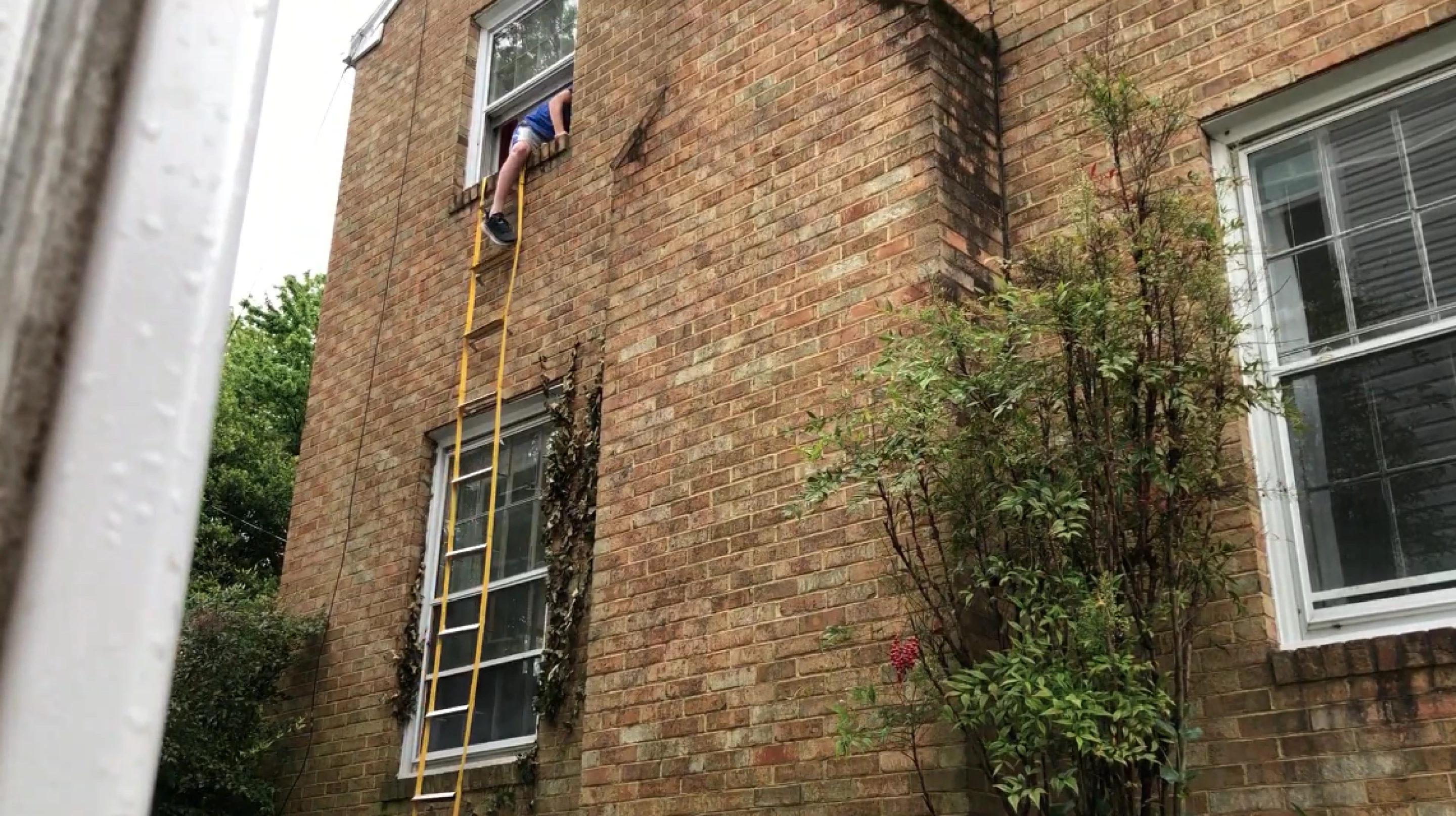 Permanent fire escape ladder hides under the window when not needed
