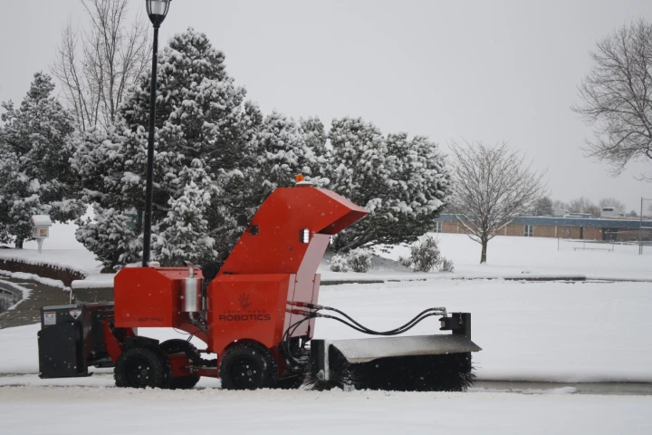 The SnowBot Pro is powered by a gas engine, and automatically avoids obstacles