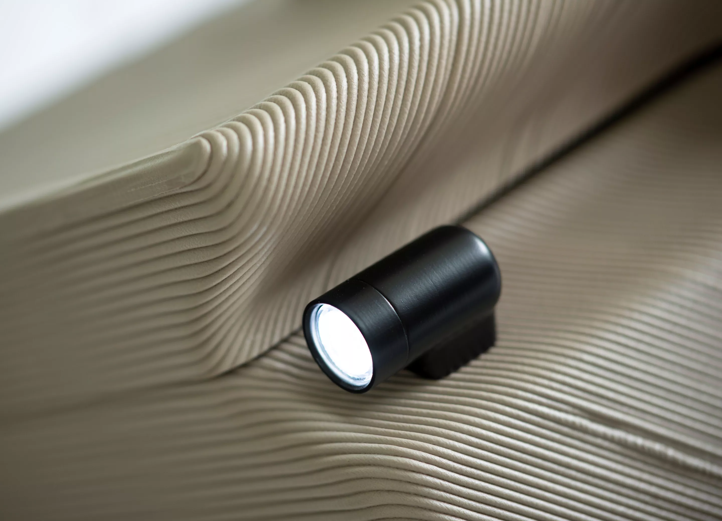 The 3D-printed chassis includes recesses for integrated lighting front and back