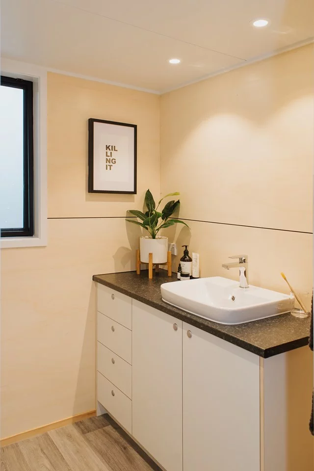 The Green Hill Farm Tiny House's bathroom includes a sink