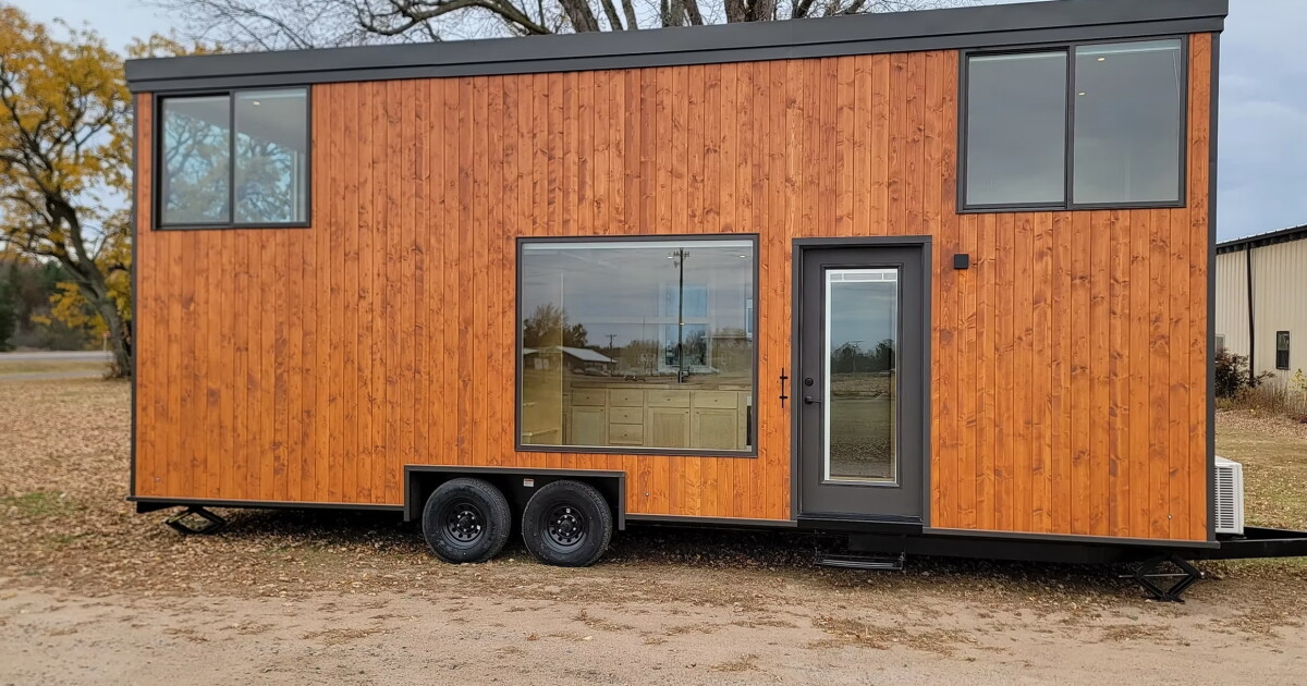 Tiny house goes wide and tall for a comfortable life on wheels