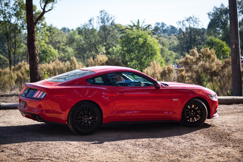 The 'Stang draws plenty of attention to itself, not least in our test car's Race Red finish