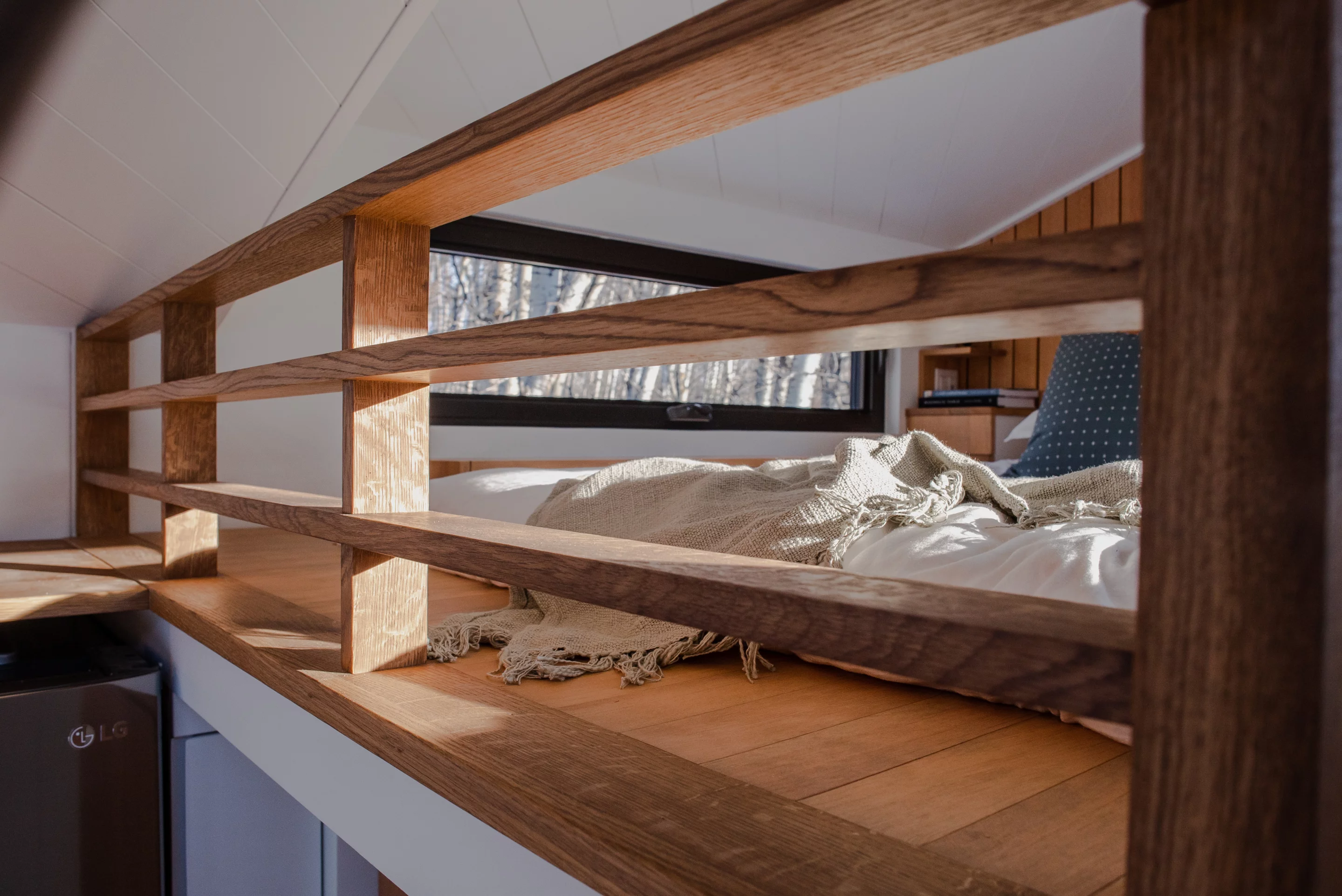 The bed has been dropped 4.25 inches (10.8 cm) into the steel frame of the loft