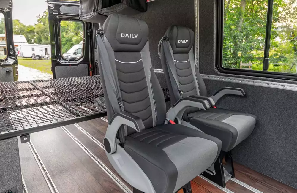 The included partition doubles as a bed platform, just add a mattress