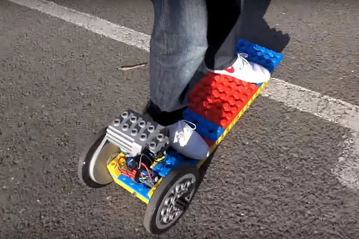 The turning circle of the 3D-printed "Lego" electric longboard isn't exactly tight, making it more suited to long straight runs than slalom