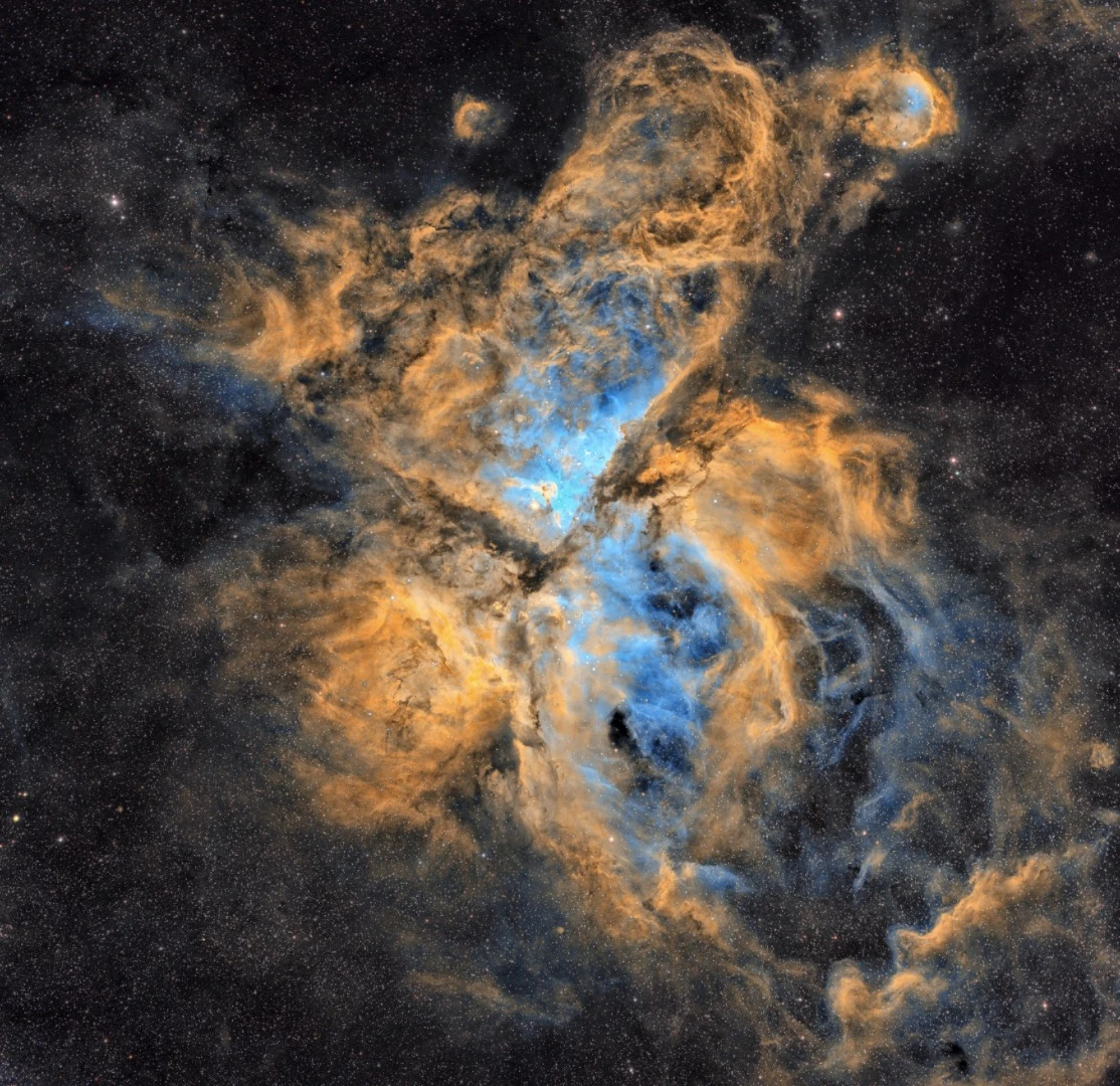 For the photographer the Carina Nebula is the most beautiful nebula in the night sky. The image showcases how extensive and colourful the Nebula really is. Using the iTelescope service he shot this picture with a monochrome camera using three different filters hydrogen alpha, OIII and SII and then, after collecting all the data, he combined those three filters into one colour image using Pixinsight. The yellows and oranges show the H-alpha and SII, and the blues show the OIII. Siding Spring Observatory, New South Wales, Australia, 24 January 2019