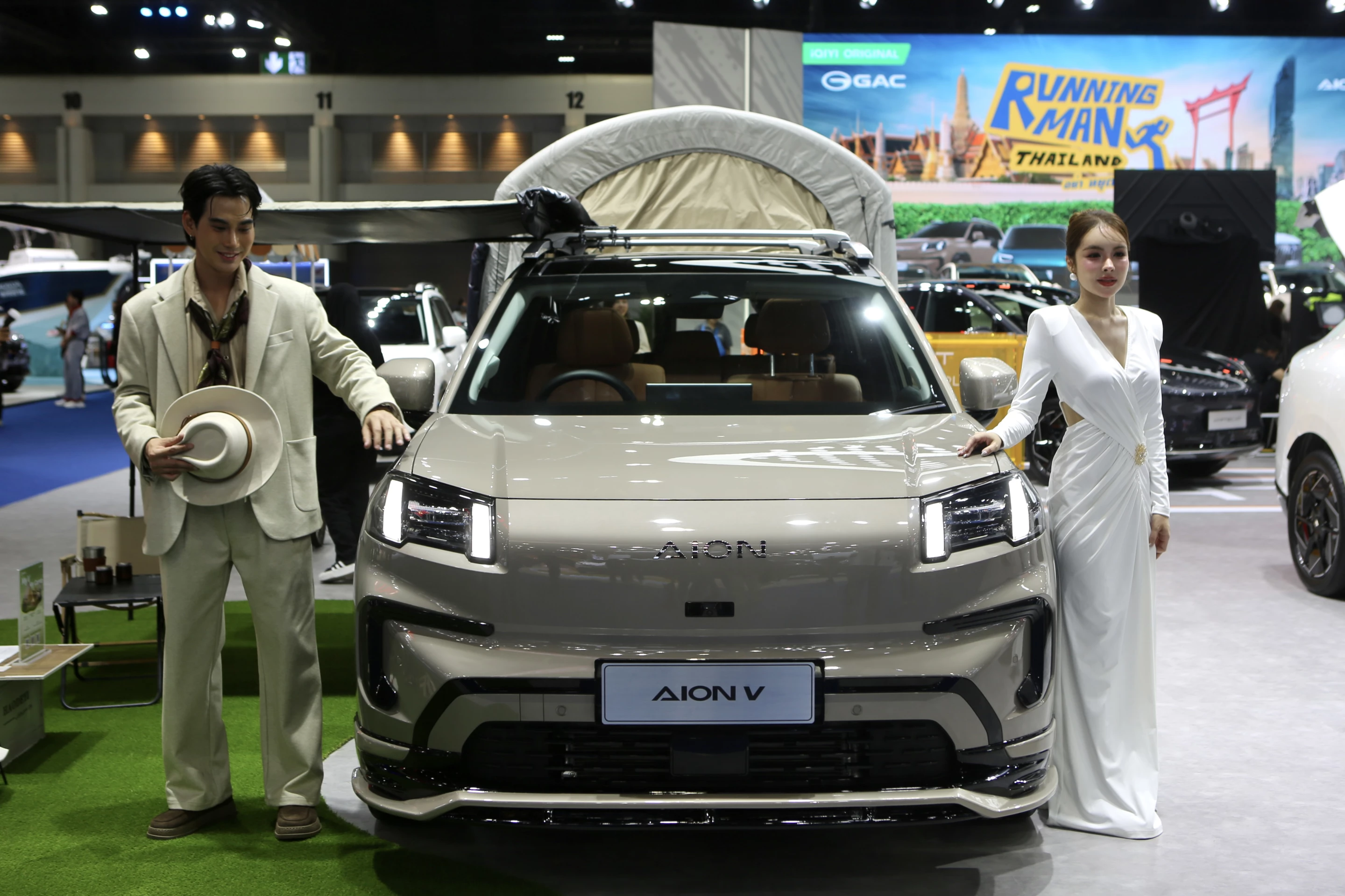 Camping weekends dress a little differently in Thailand ... at least at the Bangkok motor show