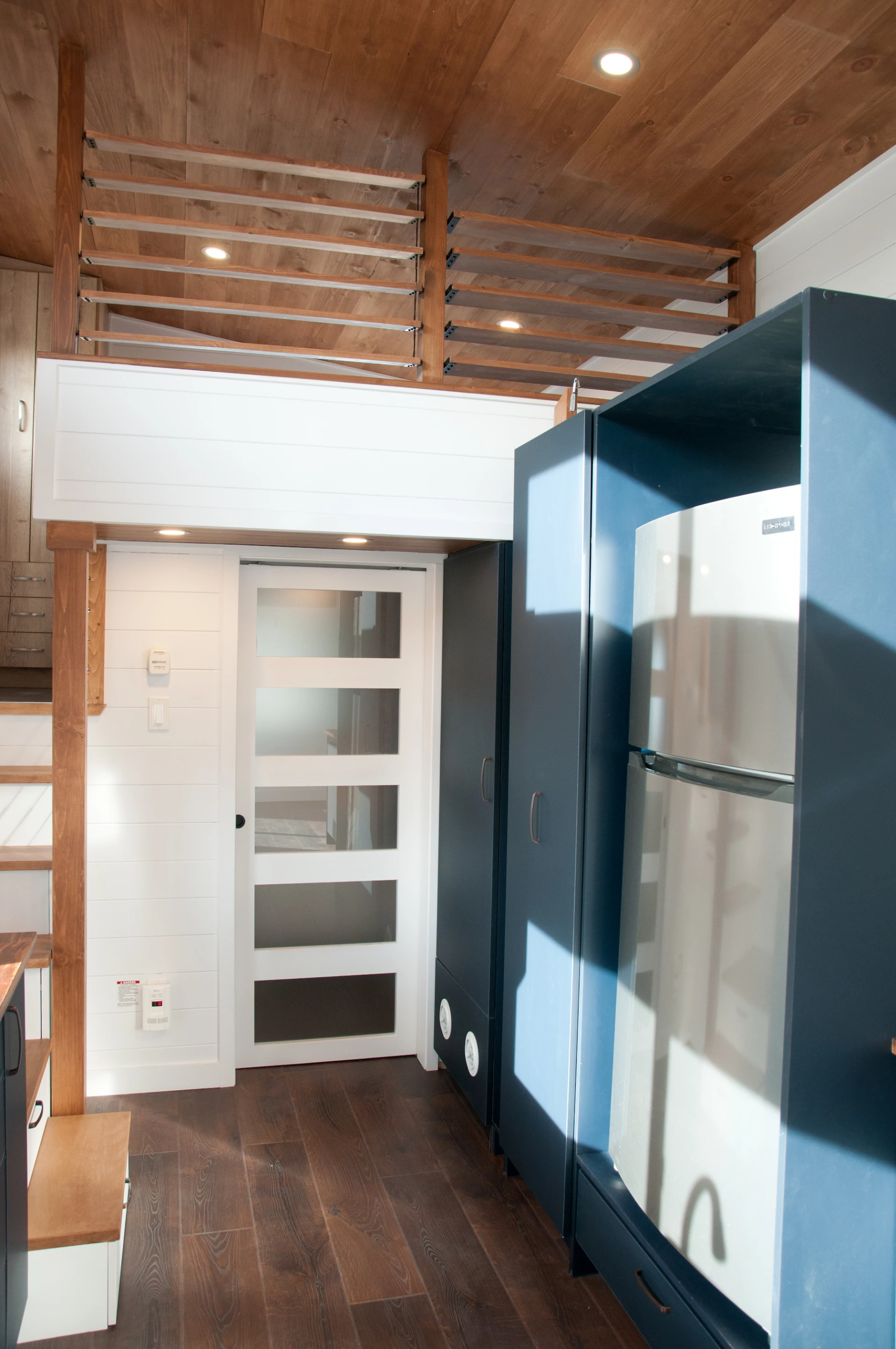 The Charme V2's kitchen includes a relatively large fridge/freezer, as well as a propane-powered range oven, and a dishwasher