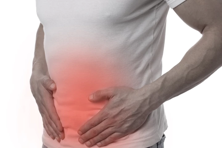 Bacteria has been engineered to produce green fluorescent molecules when it encounters a highly acidic intestinal environment