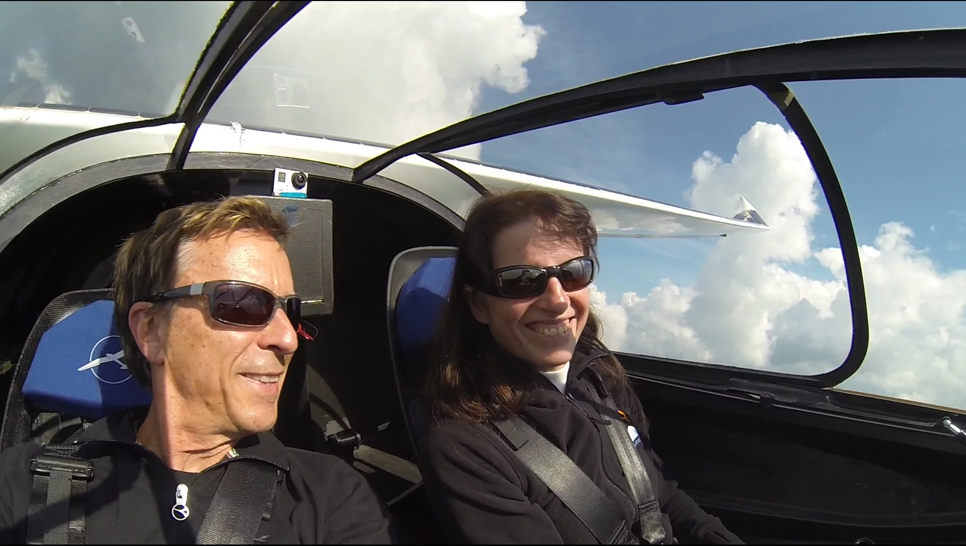 Eric and Irena Raymond fly in the Sunseeker Duo above the countryside near Milan, Italy