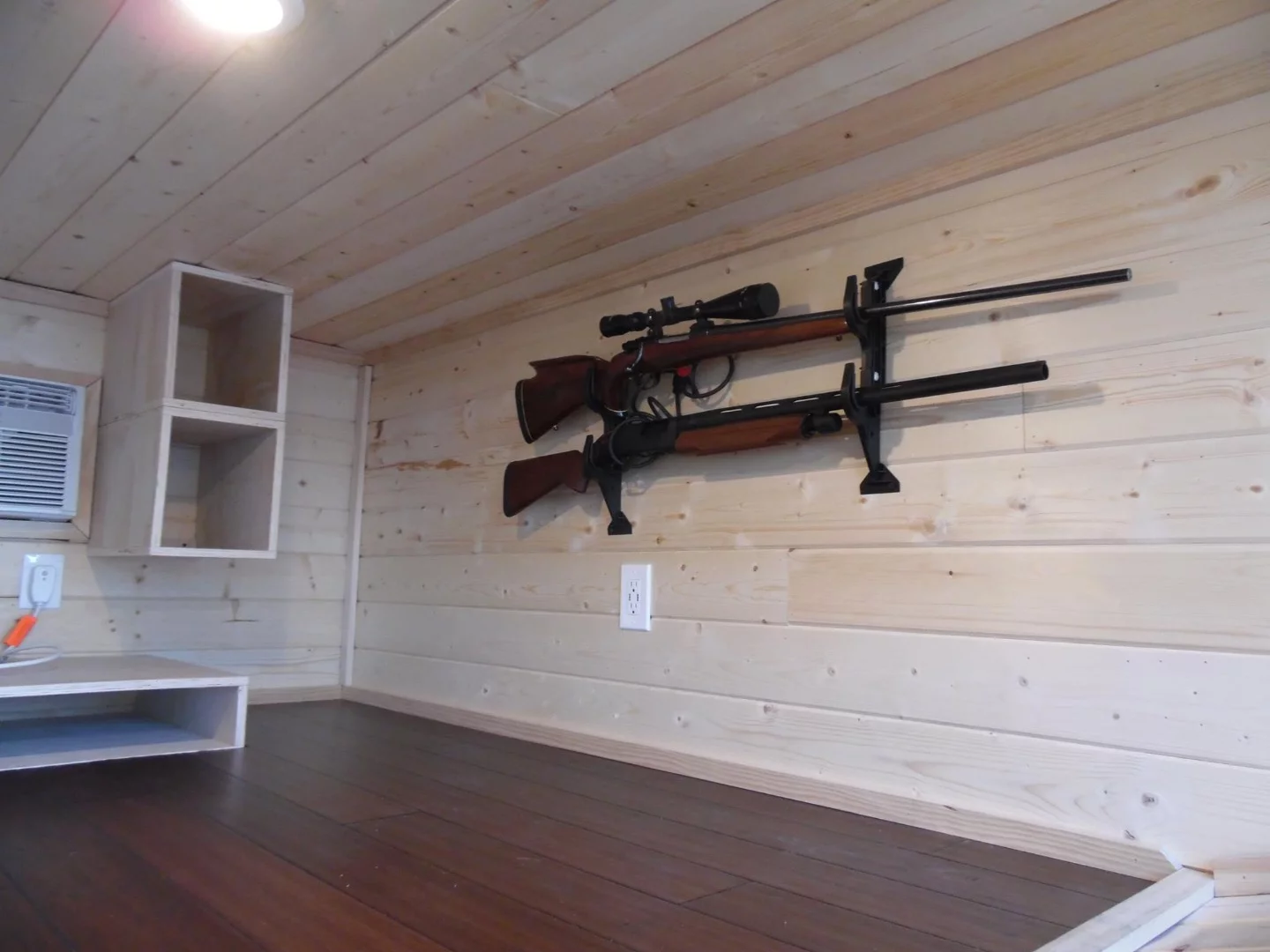 There's a total of three gun racks in the tiny house