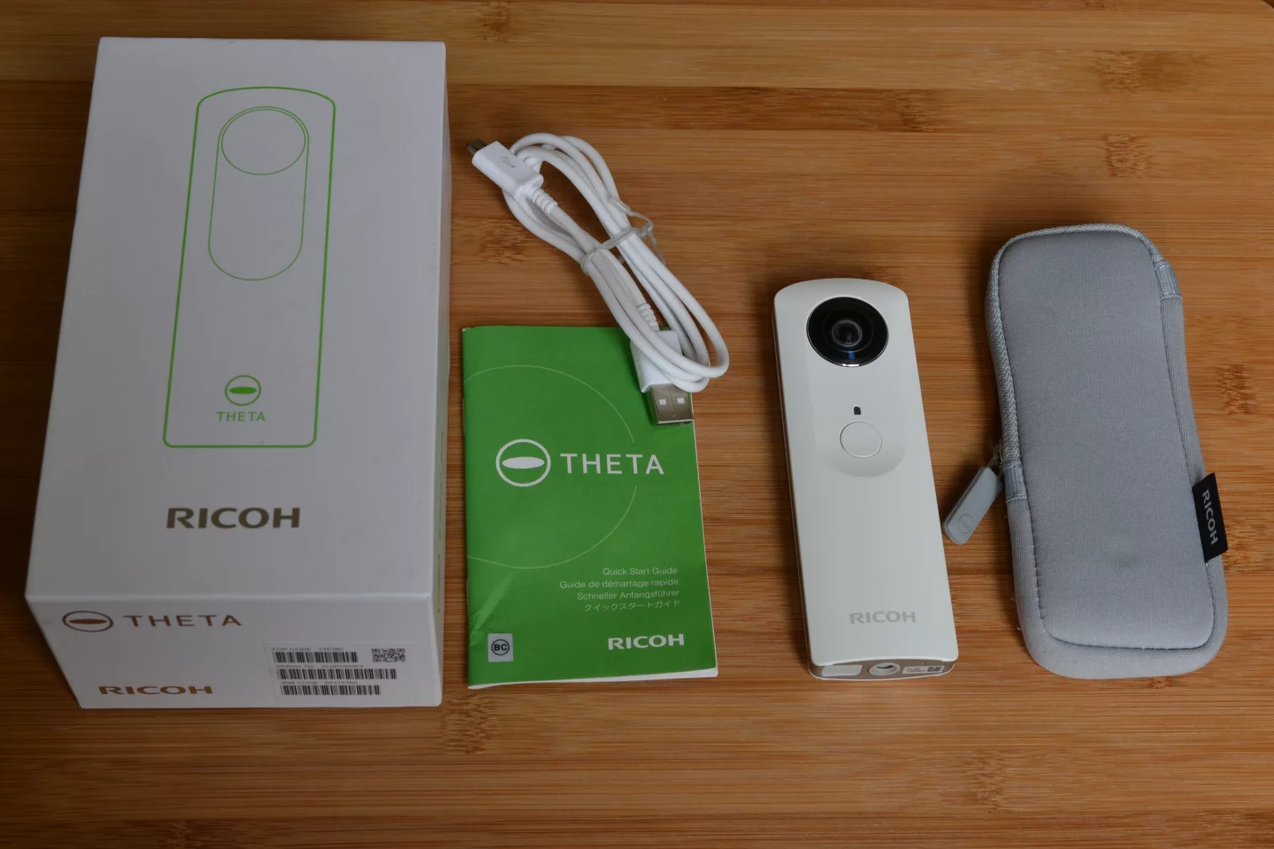 In the box, Ricoh's Theta, Quick Start guide, USB cable and soft case