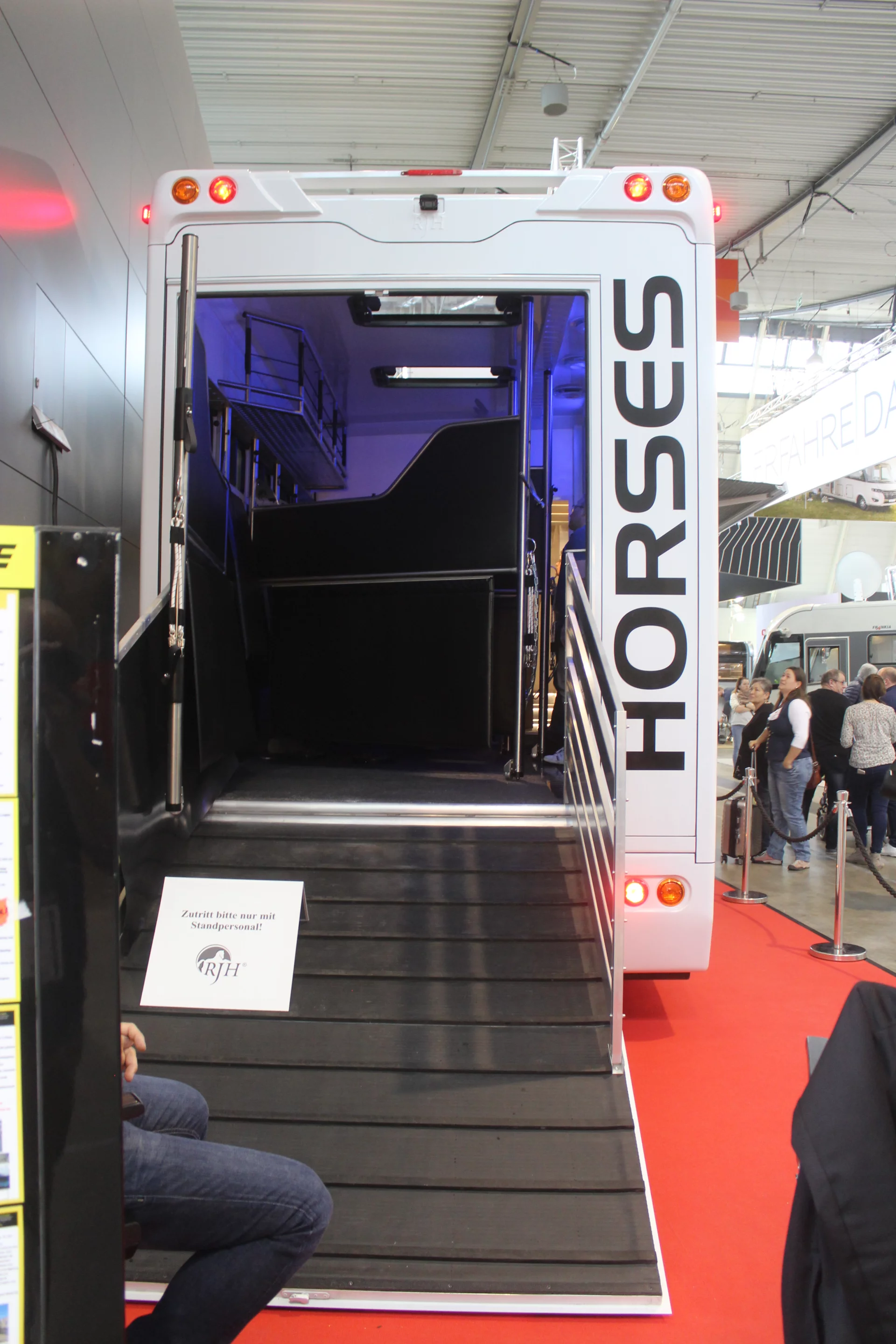 A ramp leads up to the rear horse stable