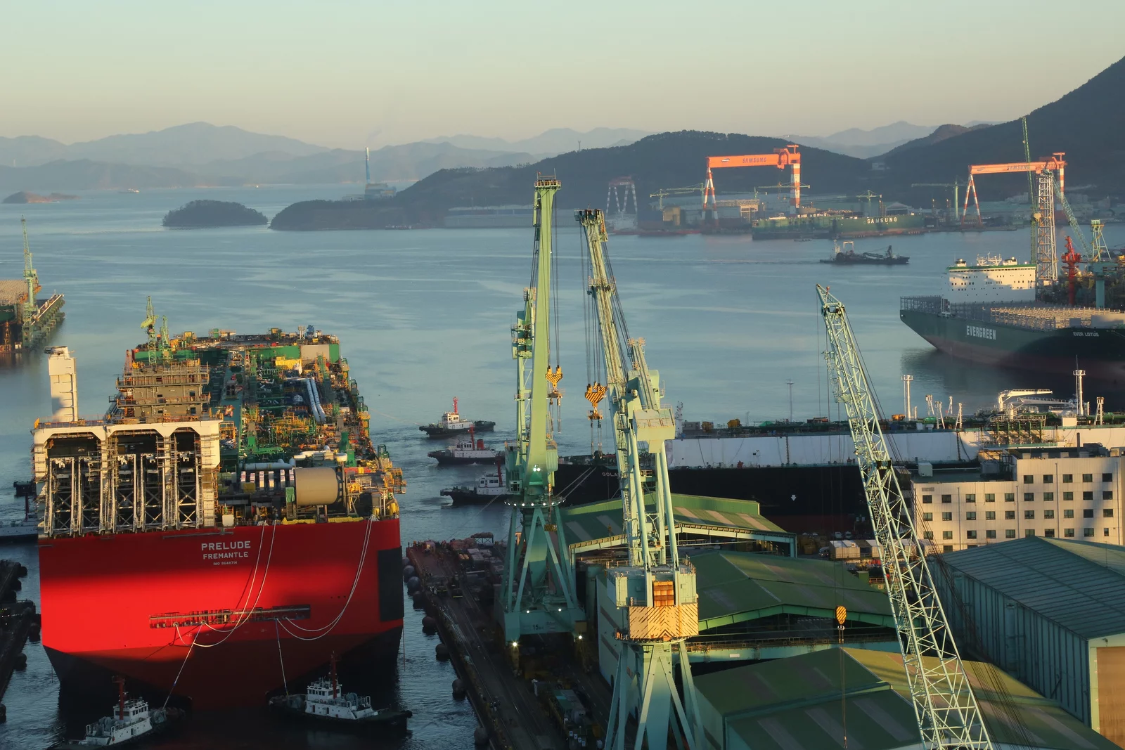 The hull of Shell's Prelude FLNG is floated out of dry dock in Geoje, South Korea