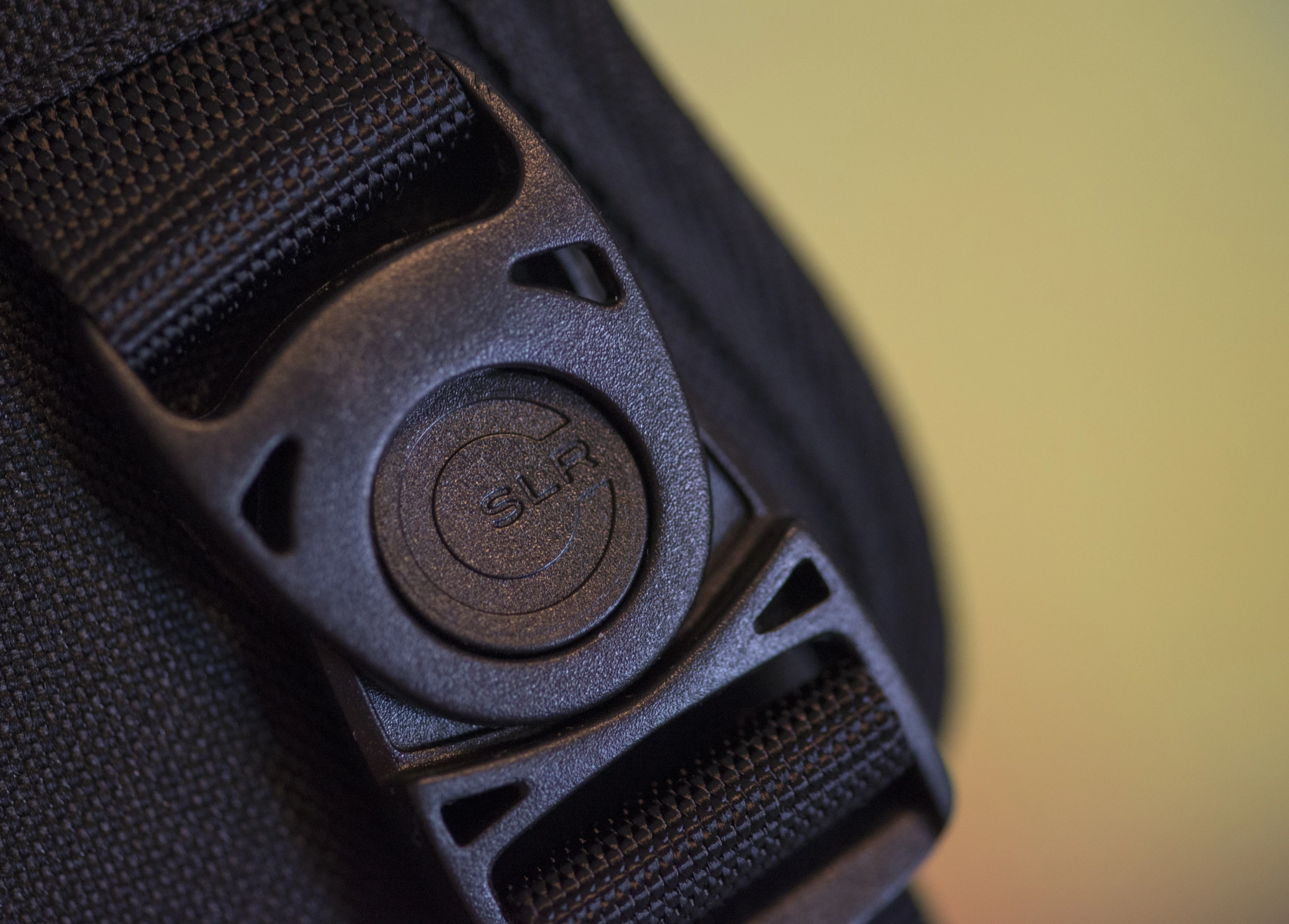 There are swivel connectors on the front and back of the Custom SLR Dual Camera Strap