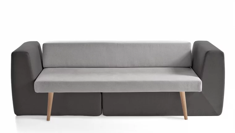A two-tone Sofista convertible sofa