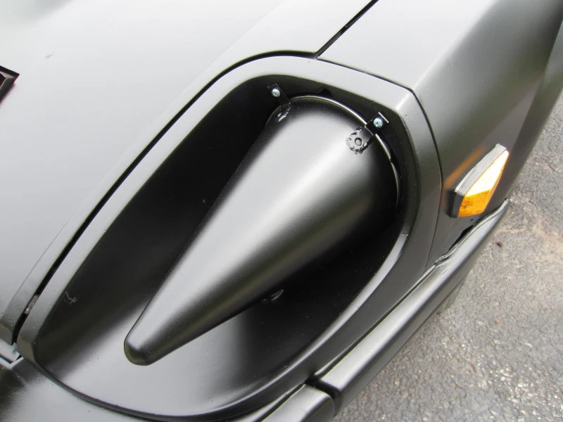 The headlight covers are modeled after the engine cones of an SR-71 Blackbird jet
